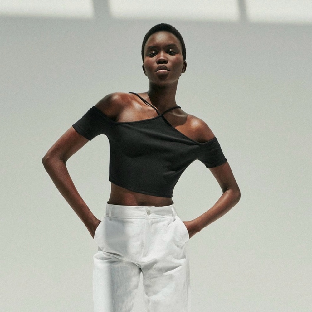 Women black short sleeve strap top size M